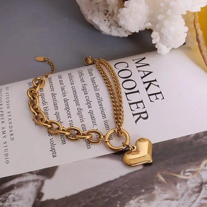 Pulsera con colgante de corazón metálico